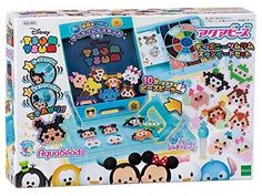 an assortment of mickey and minnie mouse stickers in a play box with the contents