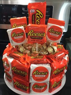 a cake made to look like it is stacked with reese's candy bars on top