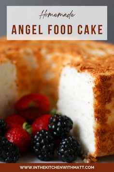 an angel food cake with berries on the side and text overlay that reads homemade angel food cake