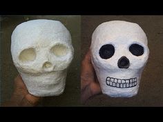 two different types of fake skulls in their hands