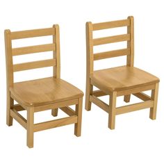 two wooden chairs sitting next to each other