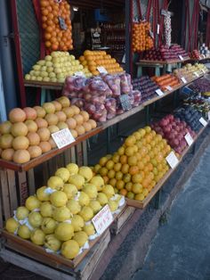 the fruit stand has many different types of fruits