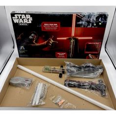 the star wars action figure is in its box and ready to be put into it