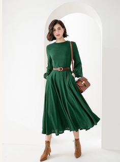 "New Arrivals Green midi Linen dress with pockets for spring autumn. DETAIL * 50% Linen, 50% cotton * Two side pockets * Long Lantern Sleeve * Small collar * Fit and flare dress * Back zipper closure * Perfect for summer, spring, autumn * Dry clean * The model is 175cm (5′9″) tall with a 80cm (31.5\") bust, 66cm (26\") waist. She is wearing in size XS CUSTOM MADE SERVICE If you * Change other color * Can't find your size in our size Chart * Change the length * Your Height is not Between 5'1\" -