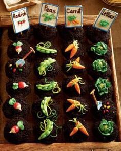 an assortment of cupcakes decorated with edible vegetables