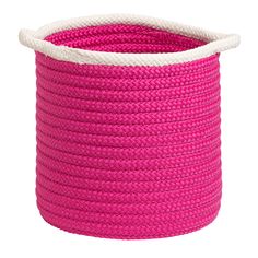 a pink rope basket with white handles