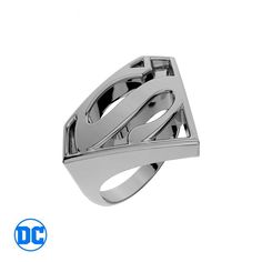 a silver ring with an intertwined design on the front and center, set against a white background