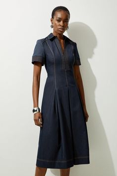 Feel Confident In Our Midi Dress, Made In Classic Denim Fabric, Featuring A Darted Waistline That Cinches The Silhouette, A Formal, Flowing Skirt, And A Shirt Style Bodice. Style It With Court Heels Or Ankle Boots For A Look Perfect For Office Days, Then Wear It With Heeled Boots Or Stilettos For An Evening Look. Tailored Denim Full Skirted Midaxi Shirt Dress High Quality Denim Fabric Flattering Fit And Flare Silhouette Formal Collar Accent Cinched, Darted Waist Zip Front Fastening Short Sleeves Hen Do Outfits, Workwear Capsule Wardrobe, Petite Midi Dress, Spring Wedding Guest Dress, Ibiza Outfits, Court Heels, Italy Outfits, Full Skirt Dress, Paris Outfits