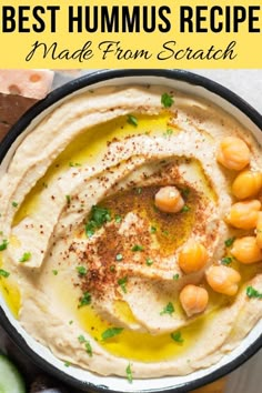 hummus with chickpeas and olives in a bowl