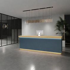 an empty lobby with a blue and gold reception desk