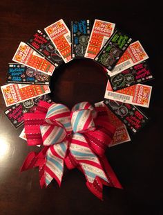 a wreath made out of candy bars on a table