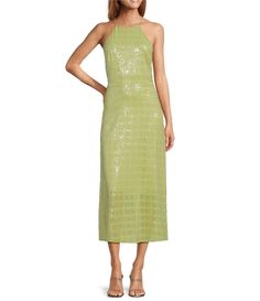 From Adelyn Rae, this midi dress features:sequin fabrication halter neckline sleeveless fully lined center zip side closure approx. 51.5" length from shoulder to hempolyester hand washImported. 