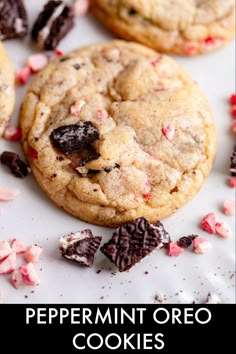 chocolate chip peppermin oreo cookies on a white plate with pink and red sprinkles