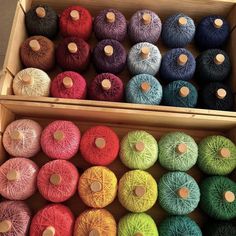 several skeins of yarn in different colors and sizes