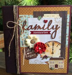 a handmade card with the words family memories on it, and flowers in front of a tree