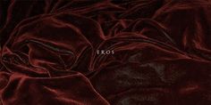 an image of red velvet fabric with the word fros on it