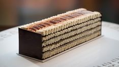 a piece of cake sitting on top of a white table