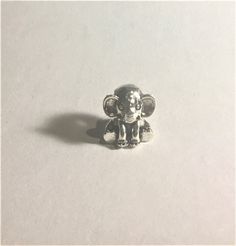 Ellie the Elephant Charm , Silver Ellie the Elephant Charm     Fits Pandora Bracelets and Necklaces as well as other European Bracelets. Please ask any questions as I do not accept returns ! Thank You for taking the time to visit my store ! Pandora Bracelet Silver, Bracelets Silver, Pandora Style, Elephant Charm, Pandora Bracelets, Bracelets And Necklaces, Ceramic Beads, Spacer Beads, Silver Bracelets