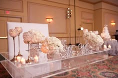 two pictures of flowers and candles in vases with the word mr and mrs on them