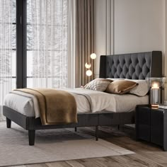 a bedroom with a bed, nightstands and windows