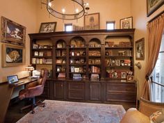 a room with a lot of books on the shelves