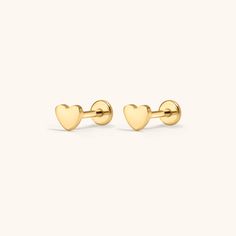 A shiny little reminder that love is all around. Introducing the Nap Earrings Collection - our signature push pin flat backs designed for 24/7 poke-free wear! Made from medical grade titanium to be safe for sensitive skin. And, for the first time, we made them in 20g (aka the same thickness as traditional earrings), so they’re perfect for lobe piercings! The push pin earring posts are easy to insert and remove from your ear, and the flat back makes them super comfortable to wear. One earring, in Nap Earrings, Lobe Piercings, Cartilage Piercings, Cartilage Earrings Stud, Flat Back Earrings, Titanium Earrings, 18k Gold Earrings, Geometric Studs, Lobe Piercing