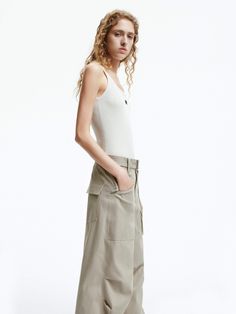 MO&Co. Women's Straight Leg Cargo Pants Elevate your casual style with our pants. Crafted from a comfy cotton blend, these pants offer a relaxed fit and wide legs that will pool effortlessly over your shoes. The folded details at the knee add a touch of industrial chic. Perfectly pairs with a fitted top for a laid-back yet trendy look. Features : - Relaxed fit, wide leg, full length- Knee pleated design, including belt- Multi cargo pockets and flap pocket at the back Code: MBD1PATT07The back len Summer Everyday Pants With Cargo Pockets, Summer Utility Cotton Wide Leg Pants, Summer Utility Wide Leg Cotton Pants, Summer Utility Style Wide Leg Cotton Pants, Chic Tapered Leg Parachute Pants For Summer, Summer Cotton Cargo Pants With Belt Loops, Chic Summer Parachute Pants With Tapered Leg, Spring Cotton Wide-leg Parachute Pants, Summer Tapered Leg Cargo Pants With Belt Loops