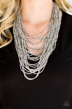 Brushed in an icy metallic shimmer, countless strands of silver seed beads drape across the chest in a bold fashion. Featuring a collision of shapes and shimmer, the glittery strands connect to two large silver accents for a flashy finish. Features an adjustable clasp closure. Sold as one individual necklace. Includes one pair of matching earrings. P2SE-SVXX-101XX Trendy Fringe, Ball Necklace, Paparazzi Accessories, Seed Bead Necklace, Paparazzi Jewelry, Silver Accents, Boutique Jewelry, Silver Stars, Bold Fashion