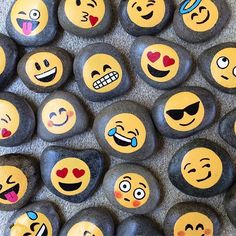 many different types of smiley faces painted on rocks