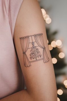 30 Heartwarming Christmas Tattoo Ideas to Celebrate the Magic of the Season Fine Line Christmas Tattoo, A Christmas Story Tattoo, Christmas Traditional Tattoo, Traditional Christmas Tattoo, Christmas Tattoo Sleeve, Christmas Tattoo Designs, Christmas Tattoo Flash, Winter Tattoo Ideas, Line Christmas Tree