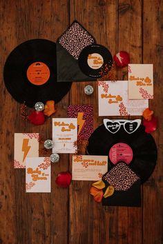 Retro wedding stationery and decor - vinyl wedding decor, disco ball decorations, heart shaped wedding sunglasses and leopard print wedding stationery | Natalescha 60s Wedding Theme Vintage, Decor With Vinyl Records, Vinyl Wedding Ideas, Rock Wedding Theme, Dr Martens Wedding, 70s Wedding Decor, 60s Wedding Theme, Retro Theme Wedding, 70s Wedding Theme