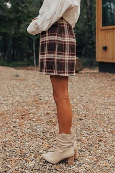 - Stop for a latte in style with this adorable skirt!
 - Fully lined brown hued plaid material
 - A waistline with side zip closure
 - A flattering silhouette that ends in a straight hemlines
 
                                                                                                                                                                   Measurements S :  Hip 36", Length 16", Waist 26".  M :  Hip 38", Length 16.5", Waist 28".  L :  Hip 40", Length 16.5", Waist 30".  XL :  Hip 42 Brown Skirt For Fall, Plaid Mini Skirt For Fall, Fall Plaid Mini Length Bottoms, Brown Lined Skirt For Fall, Fall Plaid Mini Skirt, Fall Plaid Lined Mini Skirt, Fall Brown Pleated Mini Skirt, Brown Pleated Mini Skirt For Fall, Fall Mini Length Brown Skirt