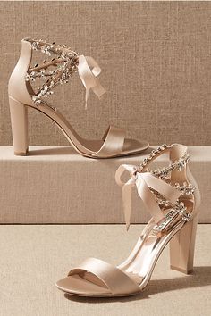 a pair of women's high heeled sandals