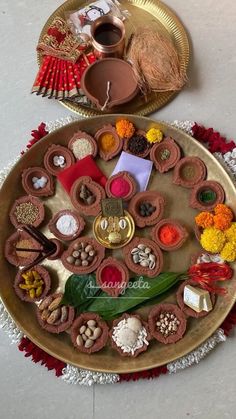 two plates with different types of food on them, one is gold and the other is red