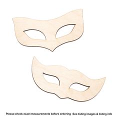 two wooden masks with the words please check measurements before ordering, see images & listing info