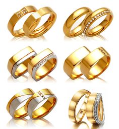 four different types of gold wedding rings with diamonds on the sides and in between them