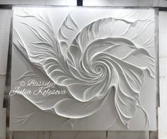 an intricately designed wall panel in white with the words beautiful julia klossona on it