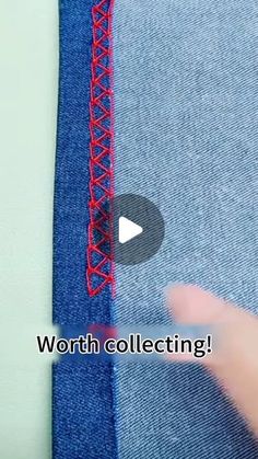 the video shows how to sew a denim jacket with red stitching on it