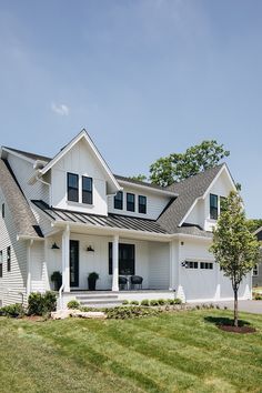 a large white house with two story windows