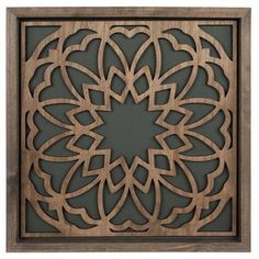 an intricate wooden frame with laser cutouts on the front and sides, featuring a flower design