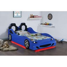 a child's bed that has been made to look like a race car with wheels