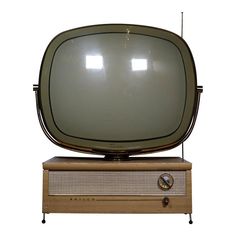 an old fashioned television sitting on top of a wooden box with radio antenna attached to it