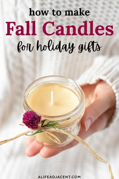 a person holding a candle with the words how to make fall candles for holiday gifts