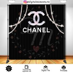 the chanel logo is displayed in front of a black backdrop with pearls and beads