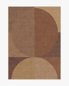 a rug with three circles on it in brown, beige and tan colors is shown