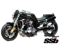 a black motorcycle parked on top of a white background with the words sso written below it