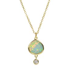 Fun, elegant, and colorful, this lab-created 10mm pear shaped opal pendant has a 3mm bezeled crystal drop. The green opal is bold and glowing, picking up different rainbow colors in the light. It is set in 925 Sterling silver with gold plate. The 18 inch chain is Sterling silver with an adjustable slider ball so it can be shortened to any length! Wear it on its own, or layer Best Friend with our other lab-created opal necklaces. Sterling silver Lab-created opal Crystal Pendant: 16x10mm Opal Necklaces, Australian Opal Pendant, Silver Lab, Moon Bracelet, Hand Necklace, Professional Jewelry, Crystal Choker, Green Opal, Hamsa Hand