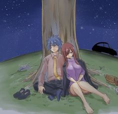 two people sitting next to each other in front of a tree and the sky with stars