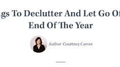 a woman in black jacket standing next to a white sign that says things to declutter and let go off the end of the year