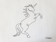 a drawing of a unicorn is shown on a piece of paper